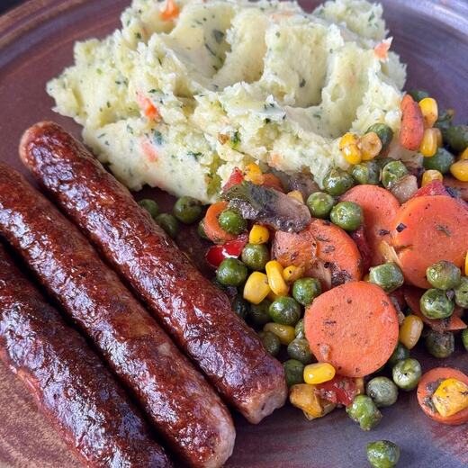 Schinken-Bratwürstchen mit Kräuter-Kartoffelstampf